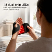 CiraWrap opened to show the illuminated red light panel across the wrist area